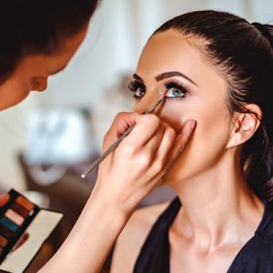 Woman Getting Eye Makeup